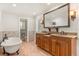 Elegant bathroom with double vanity, soaking tub, and walk-in shower at 9792 Wild Oak Dr, Windermere, FL 34786