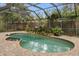Screened pool and spa with brick pavers at 9792 Wild Oak Dr, Windermere, FL 34786