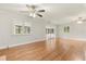Hardwood floor bedroom with sliding glass doors at 9792 Wild Oak Dr, Windermere, FL 34786