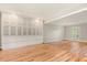 Kitchen dining area with hardwood floors and built-in white cabinets at 9792 Wild Oak Dr, Windermere, FL 34786