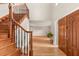 Beautiful entryway with hardwood floors and staircase at 9792 Wild Oak Dr, Windermere, FL 34786