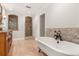 Bathroom with soaking tub and walk-in shower at 9792 Wild Oak Dr, Windermere, FL 34786