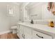 Modern bathroom with white cabinets, quartz countertops, and updated fixtures at 9792 Wild Oak Dr, Windermere, FL 34786