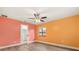 Spacious bedroom with two-toned walls and ceiling fan at 9792 Wild Oak Dr, Windermere, FL 34786