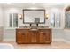 Bathroom with double vanity and granite countertop at 9792 Wild Oak Dr, Windermere, FL 34786