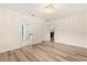 Spacious bedroom with light walls and wood-look flooring at 9792 Wild Oak Dr, Windermere, FL 34786