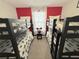 Mickey Mouse themed bedroom with bunk beds at 1572 Flange Dr, Davenport, FL 33896