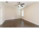 Bedroom with dark wood flooring and ceiling fan at 1907 Lazy Oaks Loop, Saint Cloud, FL 34771