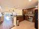 Modern kitchen with stainless steel appliances and granite countertops at 7612 Cabana Ct # 303, Reunion, FL 34747