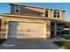 Two-story house with attached garage and landscaping at 2582 Glacier Express Ln, Tavares, FL 32778
