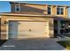 Two-story house with attached garage and landscaping at 2582 Glacier Express Ln, Tavares, FL 32778