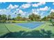 Well-maintained tennis courts with pond view at 2822 Tupelo Ct, Longwood, FL 32779