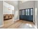 Elegant entryway with hardwood floors and a view of the dining room at 2822 Tupelo Ct, Longwood, FL 32779