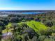 Scenic aerial view of a lush green park near a body of water at 340 Belmond Dr, Debary, FL 32713