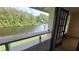 Enjoy tranquil water views from this relaxing balcony at 4641 Cason Cove Dr # 2124, Orlando, FL 32811