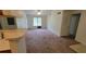Open concept living room with kitchen at 4641 Cason Cove Dr # 2124, Orlando, FL 32811