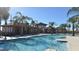 Stunning pool area with a cabana and lush landscaping at 5160 Oakbourne Ave, Davenport, FL 33837