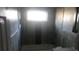 Updated bathroom with tile flooring and bathtub at 5900 Judy Dee Dr, Orlando, FL 32808