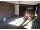Screened porch with brick and wood paneling at 5900 Judy Dee Dr, Orlando, FL 32808