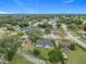 Wide aerial view of the house and surrounding community at 7471 Crooked Lake Cir, Orlando, FL 32818