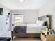 Main bedroom with a large bed and plenty of natural light at 7471 Crooked Lake Cir, Orlando, FL 32818