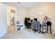 Well-lit bedroom with a desk, chair, and plenty of space for storage at 7471 Crooked Lake Cir, Orlando, FL 32818