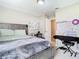 Bedroom with a king-size bed and adjacent piano at 7471 Crooked Lake Cir, Orlando, FL 32818