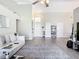 Bright living area featuring hardwood floors and an open concept layout at 7471 Crooked Lake Cir, Orlando, FL 32818