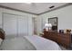 Bright bedroom with double bed, dresser, and large closet at 10121 Lone Tree Ln, Orlando, FL 32836