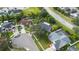 An aerial view showcasing the home's curb appeal and neighborhood context at 12512 Tillingham Sw Ct, Orlando, FL 32837