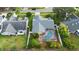 Aerial view highlighting the home's private pool and backyard oasis at 12512 Tillingham Sw Ct, Orlando, FL 32837