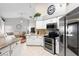 Bright kitchen, stainless steel appliances, granite countertops at 12512 Tillingham Sw Ct, Orlando, FL 32837