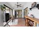 Outdoor entertaining space with bar and access to the pool at 12512 Tillingham Sw Ct, Orlando, FL 32837