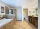 Spacious bathroom with soaking tub and walk-in shower at 1522 Moon Valley Dr, Davenport, FL 33896