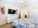 Bedroom with a queen-size bed and ensuite bathroom at 1522 Moon Valley Dr, Davenport, FL 33896