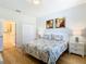 Bedroom with a queen-size bed and ensuite bathroom at 1522 Moon Valley Dr, Davenport, FL 33896
