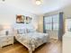 Bedroom with a queen-size bed and ensuite bathroom at 1522 Moon Valley Dr, Davenport, FL 33896
