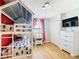 Mickey Mouse themed bedroom with a bunk bed at 1522 Moon Valley Dr, Davenport, FL 33896