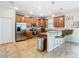 Kitchen with wood cabinets, granite countertops, and stainless steel appliances at 1522 Moon Valley Dr, Davenport, FL 33896