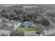 Aerial view of a single-Gathering home with a pool and large backyard at 2045 Woody Dr, Windermere, FL 34786