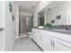 Bathroom with double vanity, shower, and toilet at 2770 Bookmark Dr, Kissimmee, FL 34746