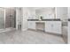Bathroom with double vanity, shower, and tub at 2770 Bookmark Dr, Kissimmee, FL 34746