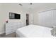 Bedroom with queen bed and dresser at 2770 Bookmark Dr, Kissimmee, FL 34746