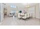 Bright dining area with seating for eight at 2770 Bookmark Dr, Kissimmee, FL 34746