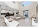 Open living room with high ceilings and access to kitchen at 2770 Bookmark Dr, Kissimmee, FL 34746