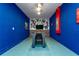 Fun game room with foosball table and superhero mural at 2770 Bookmark Dr, Kissimmee, FL 34746