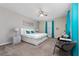 Main bedroom with king bed and seating area at 2770 Bookmark Dr, Kissimmee, FL 34746