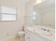 Clean bathroom with tiled walls and bathtub at 3314 Trentwood Blvd, Belle Isle, FL 32812