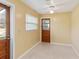 Sunroom with wood door and view of the backyard at 3314 Trentwood Blvd, Belle Isle, FL 32812