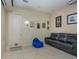Media room includes comfortable seating, a projector screen, and built-in speakers at 36 Allenwood Look, Ormond Beach, FL 32174